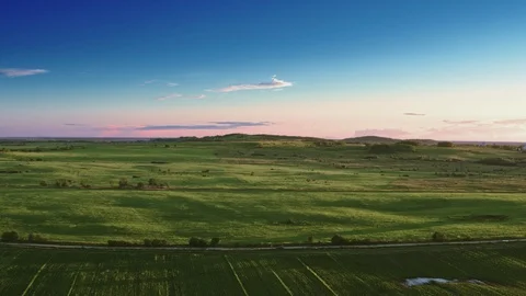 Flying over green fields Stock Footage 109200326