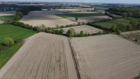 Flying over green fields Stock Footage 284244780