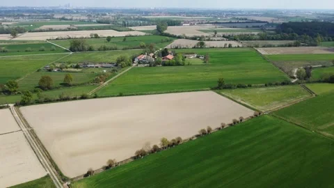 Flying over green fields Stock Footage 284244781