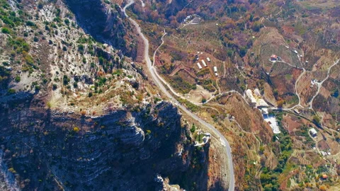 Flying over the green valley. Beautiful valley view from above. Dry river Stock Footage 168901336