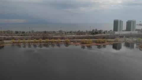 Flying over Grenadier Pond in High Park, Toronto Stock Footage 130074763