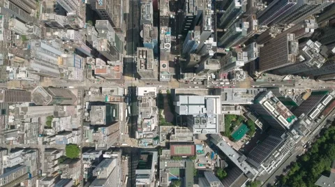 Flying over grid structure, overhead view of dense urban Hong Kong city Stock Footage