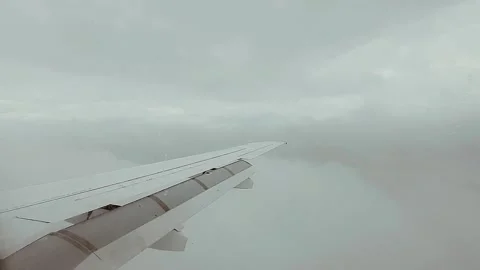 Flying over the ground. flying through the clouds Stock Footage 250278392