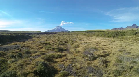 Flying over a gully leading from the active Cotopaxi Volcano, Ecuador. Stock Footage 56634588