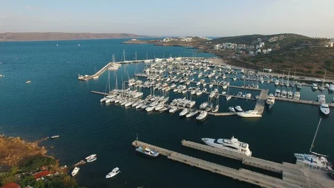 Flying over harbor with luxury white yachts, sailing boats and catamarans Stock Footage 87105093
