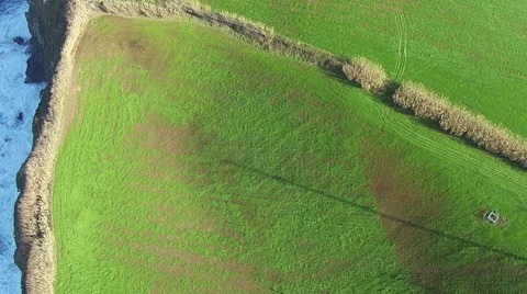 Flying over the High Cliffs and Ocean Waves Stock Footage 46223132