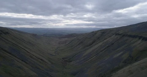 Flying over High Cup Nick in Cumbria Stock Footage 121189975
