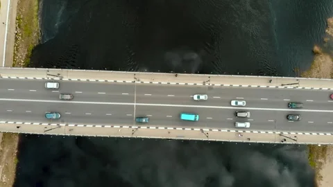 Flying over a highway bridge 库存影片 242082150
