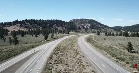 Flying Over the Highway in Eastern Sierra Nevada Mountains Inyo National Forest Video stock 219581266