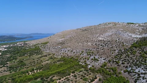 Flying over a hill devastated with a forest fire in Dalmatia, Croatia Stock Footage 100725004