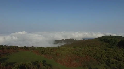Flying over the hills above the clouds. 스톡 동영상 60586752