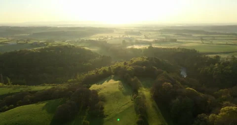 Flying over the hills and forest Stock Footage 334055268