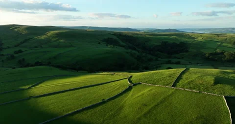 Flying over the hills in Malhamdale Stock Footage 343836865