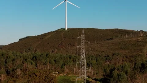 Flying Over The Hills Towards The Wind Turbine At  Wind Farm Substation Stock Footage 298921355