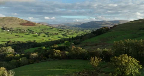 Flying over hilly landscape in north England Stock Footage 220139271