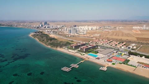 Flying over the hotels near the seafront. Expensive hotels on the sea. Beaches. Stock Footage 276294591