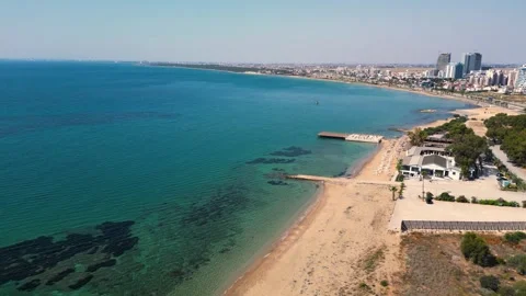 Flying over the hotels near the seafront. Expensive hotels on the sea. Beaches. Stock-Footage 276294895