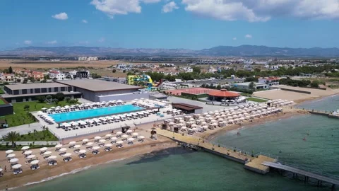Flying over the hotels near the seafront. Expensive hotels on the sea. Beaches. Stock Footage 276295408