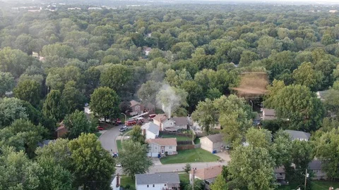 Flying over a housefire Stock Footage 114750632