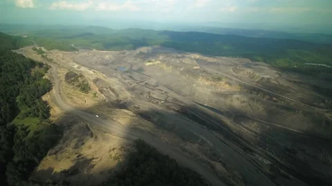 Flying over a huge coal quarry Stock Footage 145292392