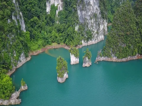 Flying over the Huge rocks in Cheow Lan Lake Stock Footage 78229596