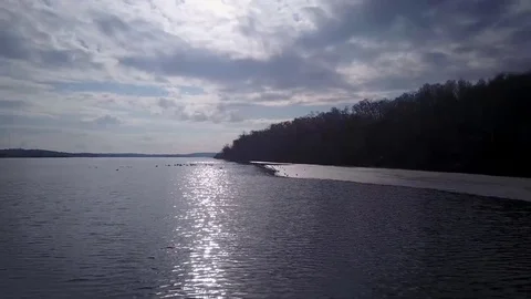 Flying over an icy lake Stock Footage 77718431