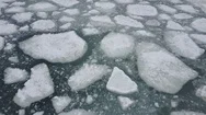Flying Over Icy Shore And Drifting Melted Ice Stock Footage