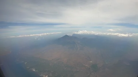 Flying over Indonesia Stockbeeldmateriaal 127390137