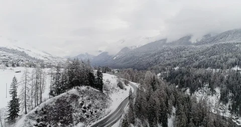 Flying over an intersection and a bridge in a snowy landscape Stockbeeldmateriaal 92536529