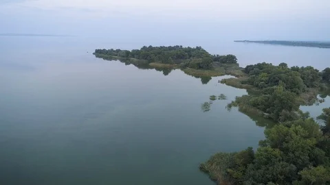 Flying over the island in the evening before sunset. Aerial view Stock Footage 123200765