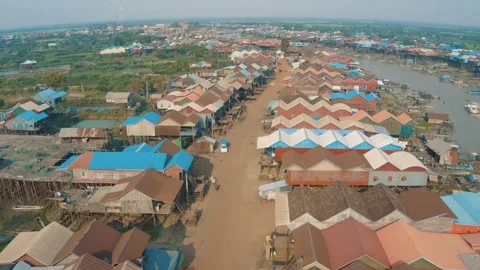 Flying over of Kampong Phluk Floating Village in Siem Reap Cambodia Stock Footage 243412888