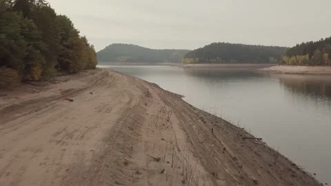Flying over a lake and dead trees in the morning 4k 03 Stock Footage 147137241