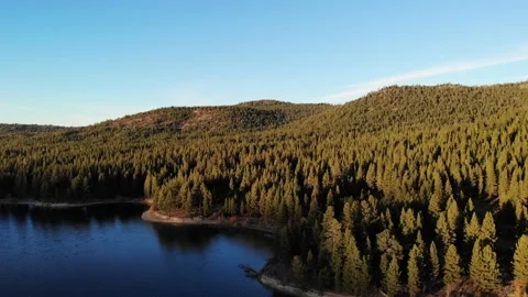Flying Over Lake Davis at Sunset Aerial Stock Footage 135957346
