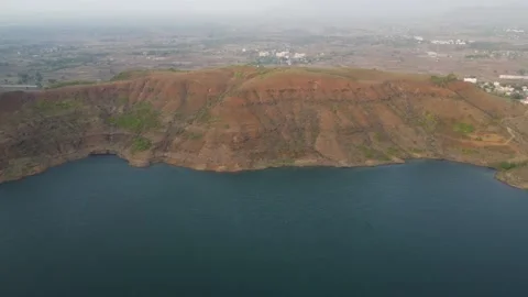 Flying over lake during sunset Video stock 156565985