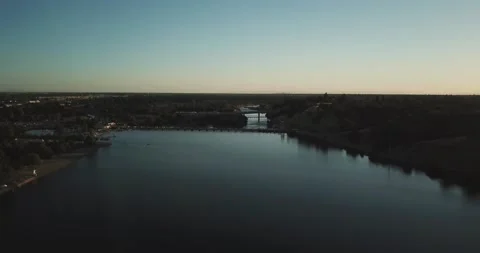 Flying over lake at dusk Stock Footage 134911313
