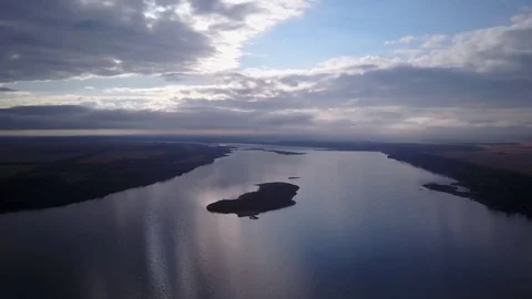 Flying over a lake Stock Footage 77716159