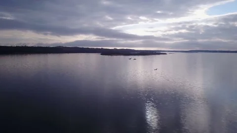 Flying over a lake Stock Footage 77716618