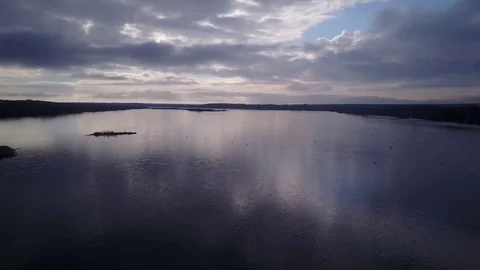 Flying over a lake Stock Footage 77716908