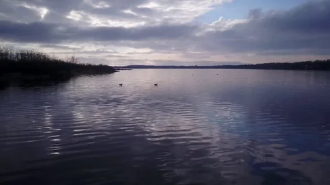Flying over a lake Stock Footage 77716964