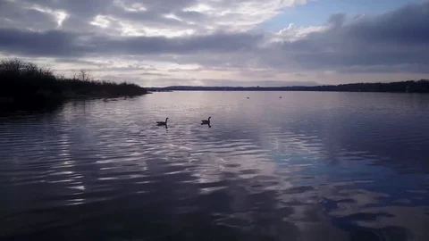Flying over a lake Stock Footage 77716971