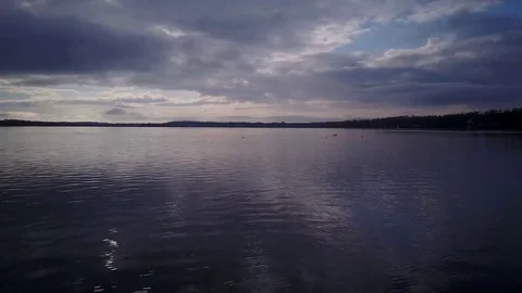 Flying over a lake Stock Footage 77717278
