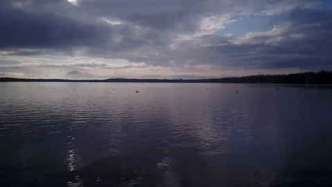 Flying over a lake Stock Footage 77717303