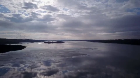 Flying over a lake Stock Footage 77717423