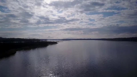 Flying over a lake Stock Footage 77717675