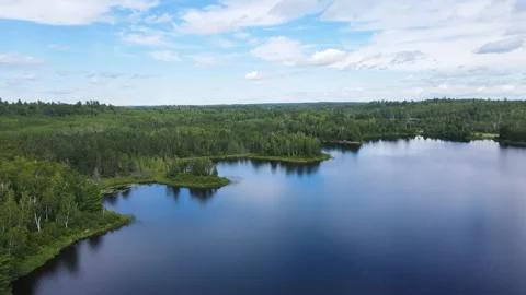 Flying over lakes and forest in Minnesota Stockbeeldmateriaal 242053602