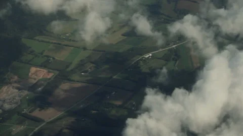 Flying Over Land and Clouds 002 Stock Footage 38221749