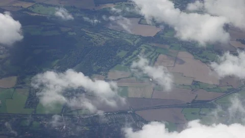 Flying over land with clouds view from the plane Stock Footage 71100369