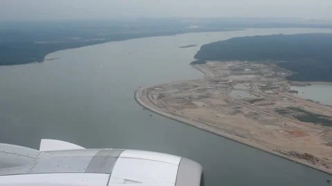 Flying over a land development project in Singapore Stock Footage 247144862