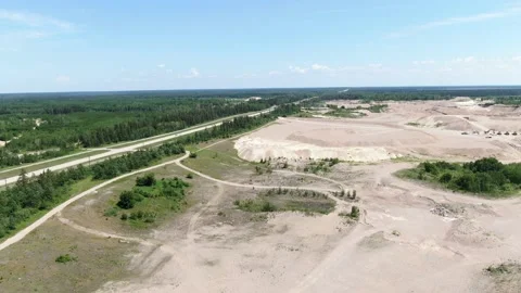 Flying over a large quarry in the prairies Stock Footage 140263576