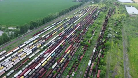 Flying over large train depot near Ploiesti , Romania. Video stock 132959678